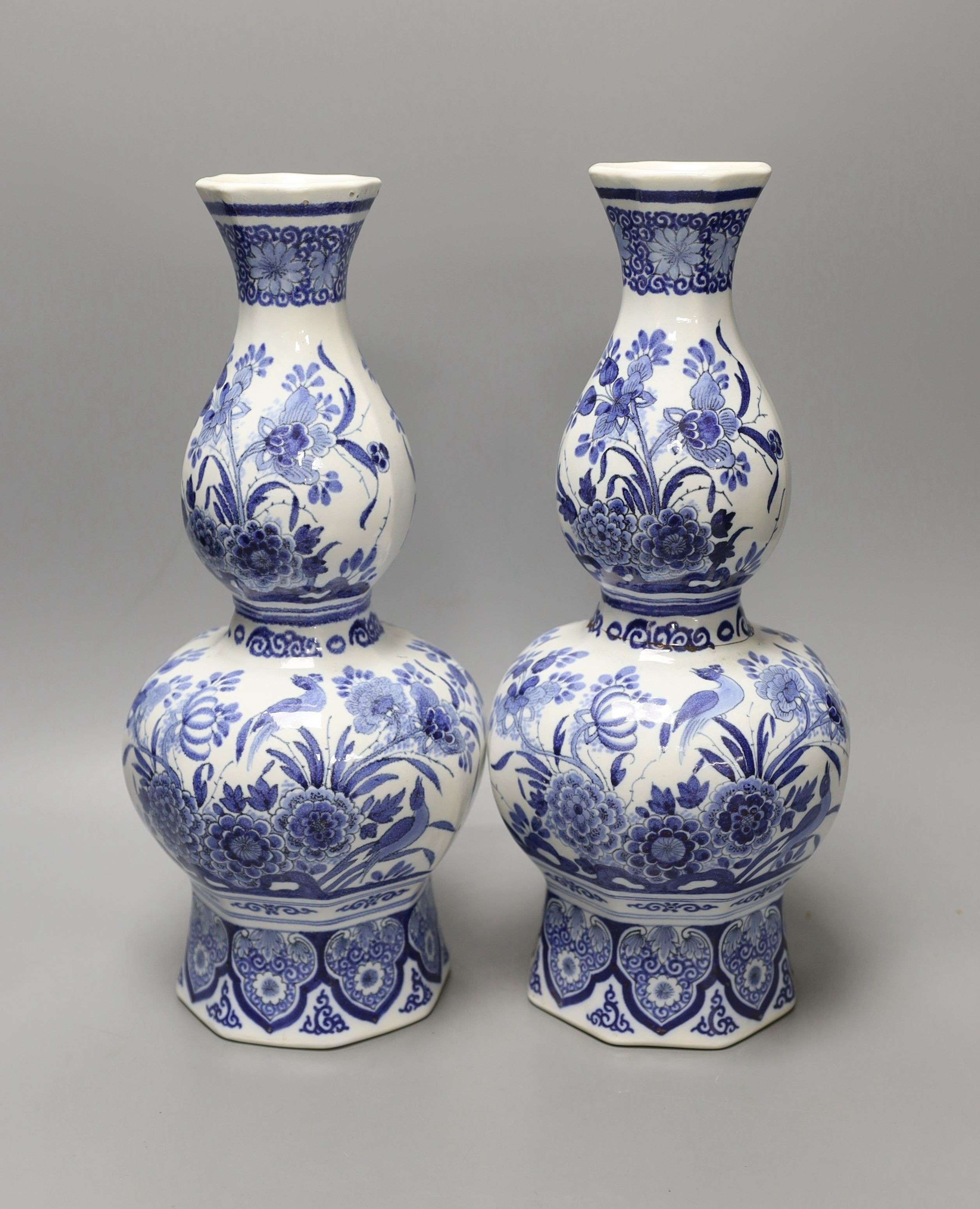 A pair of 19th century Dutch Delft vases - 33.5cm tall